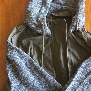 Olive green and grey jacket band around the waist